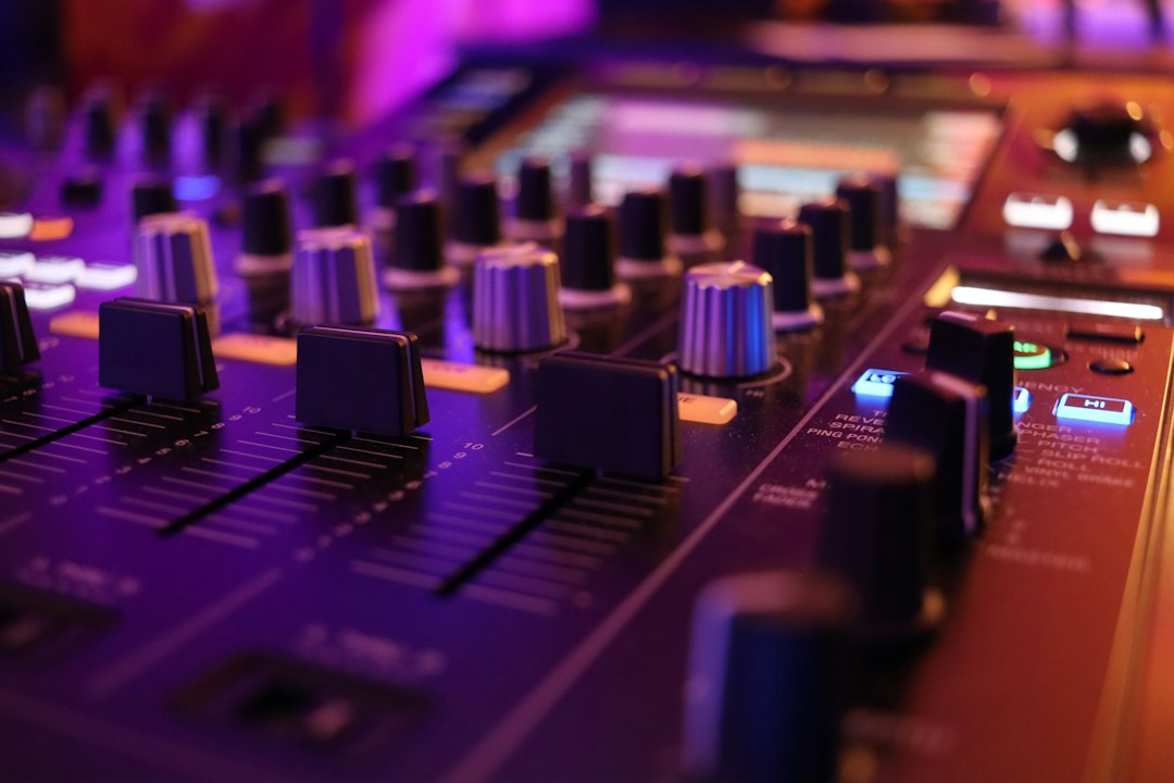 a-close-up-of-a-mixing-board-in-a-recording-studio-ar5wllndt54
